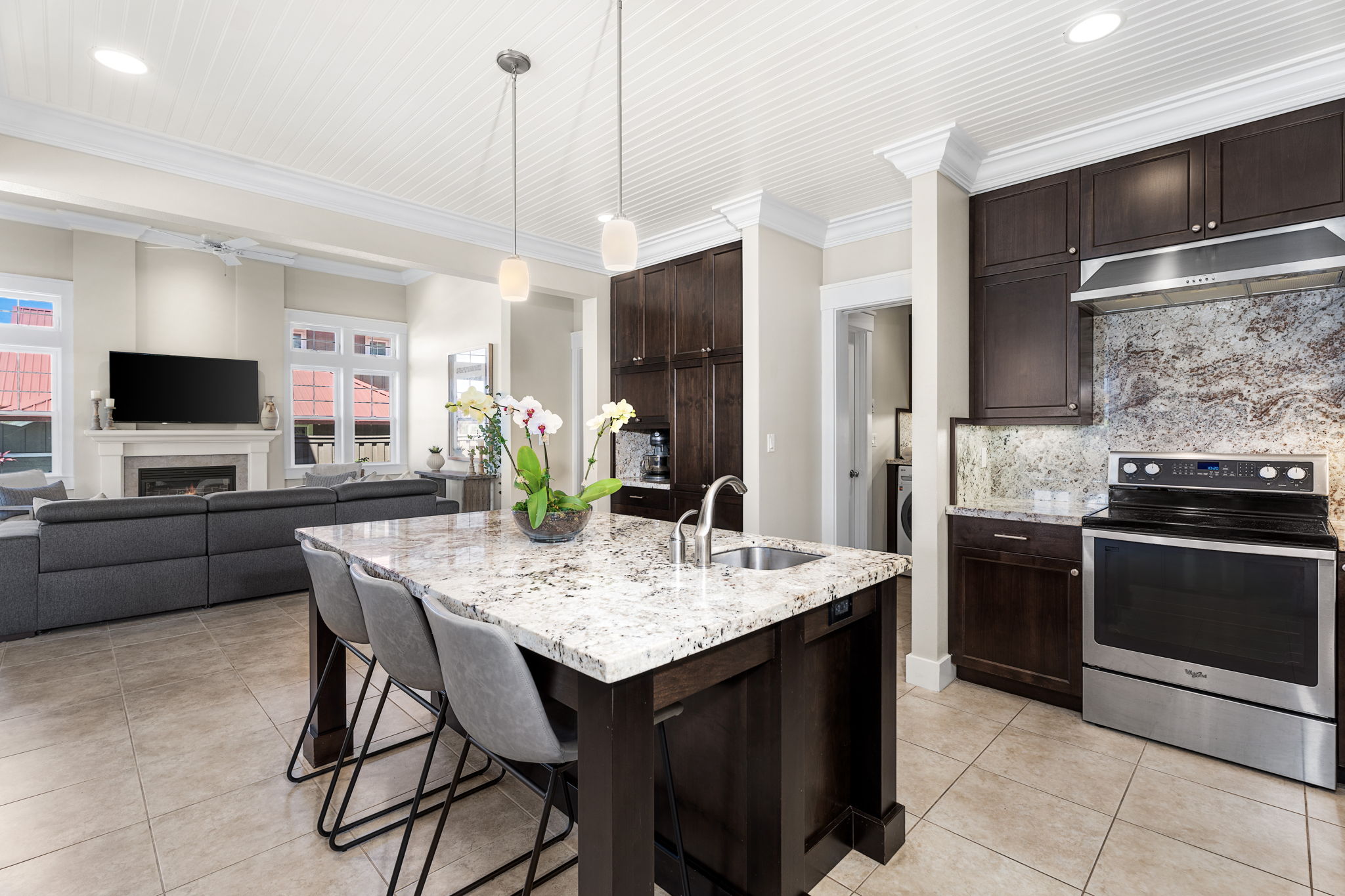 65-1294 Hoku Road Kamuela, HI 96743 - Photo 5 of 30 a kitchen with stainless steel appliances granite countertop a stove a sink and a refrigerator