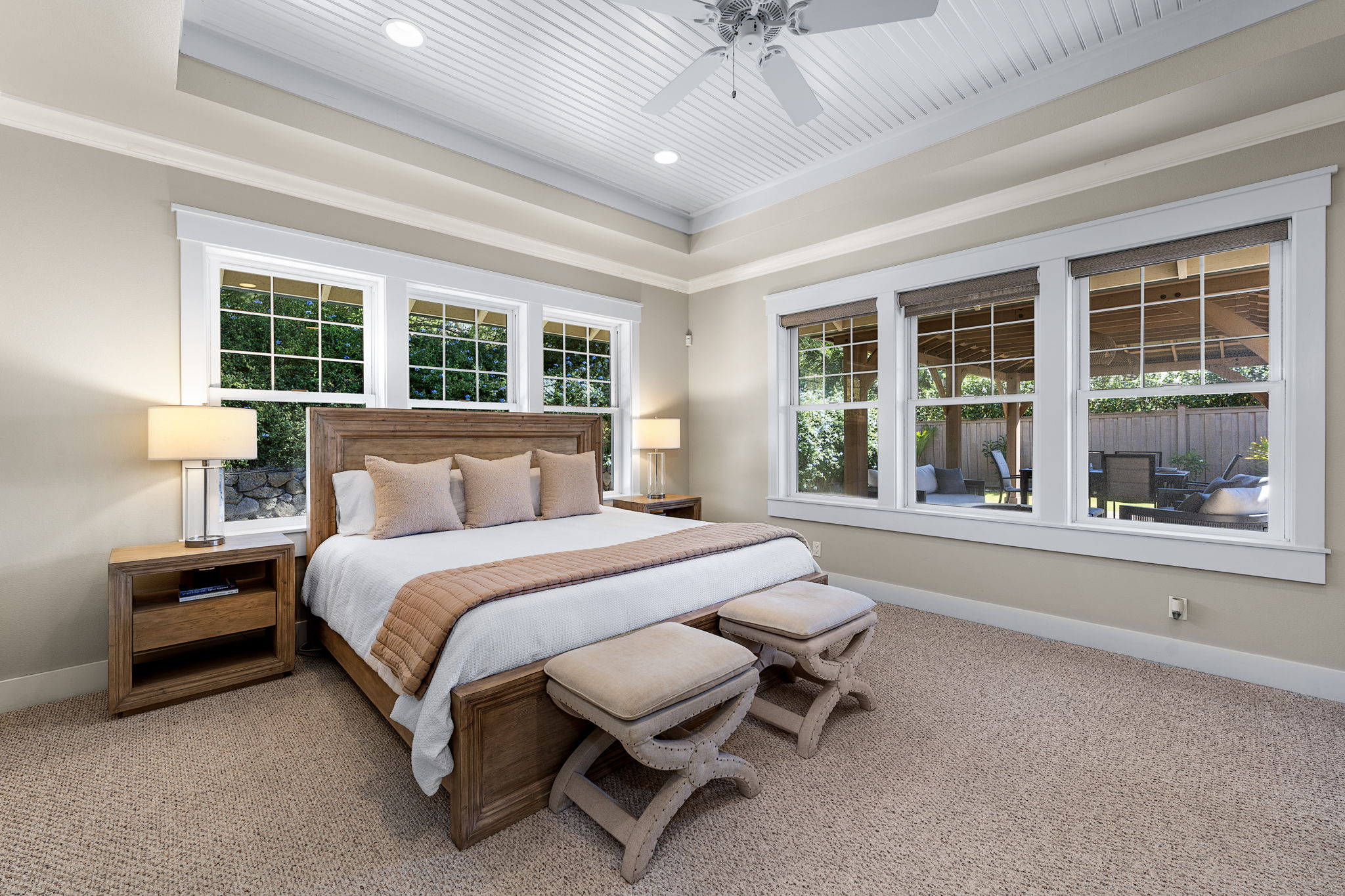 65-1294 Hoku Road Kamuela, HI 96743 - Photo 7 of 30 a spacious bedroom with a bed and a large window with balcony view