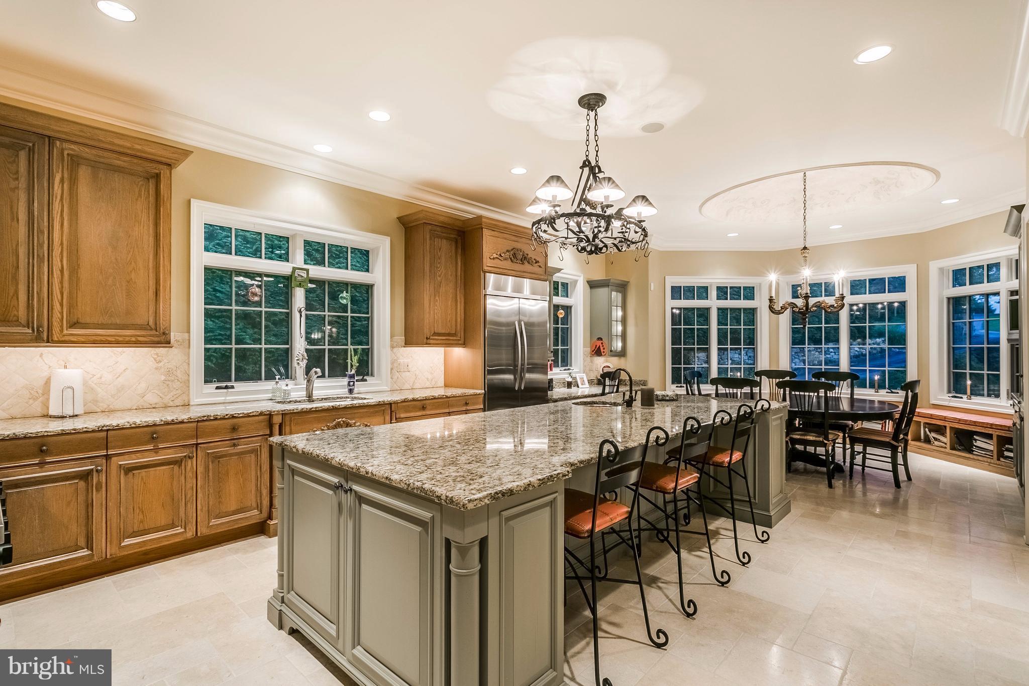 5 Hayfields Road Hunt Valley, MD 21030 - Photo 7 of 30 a view of a dining room and livingroom with furniture wooden floor a chandelier