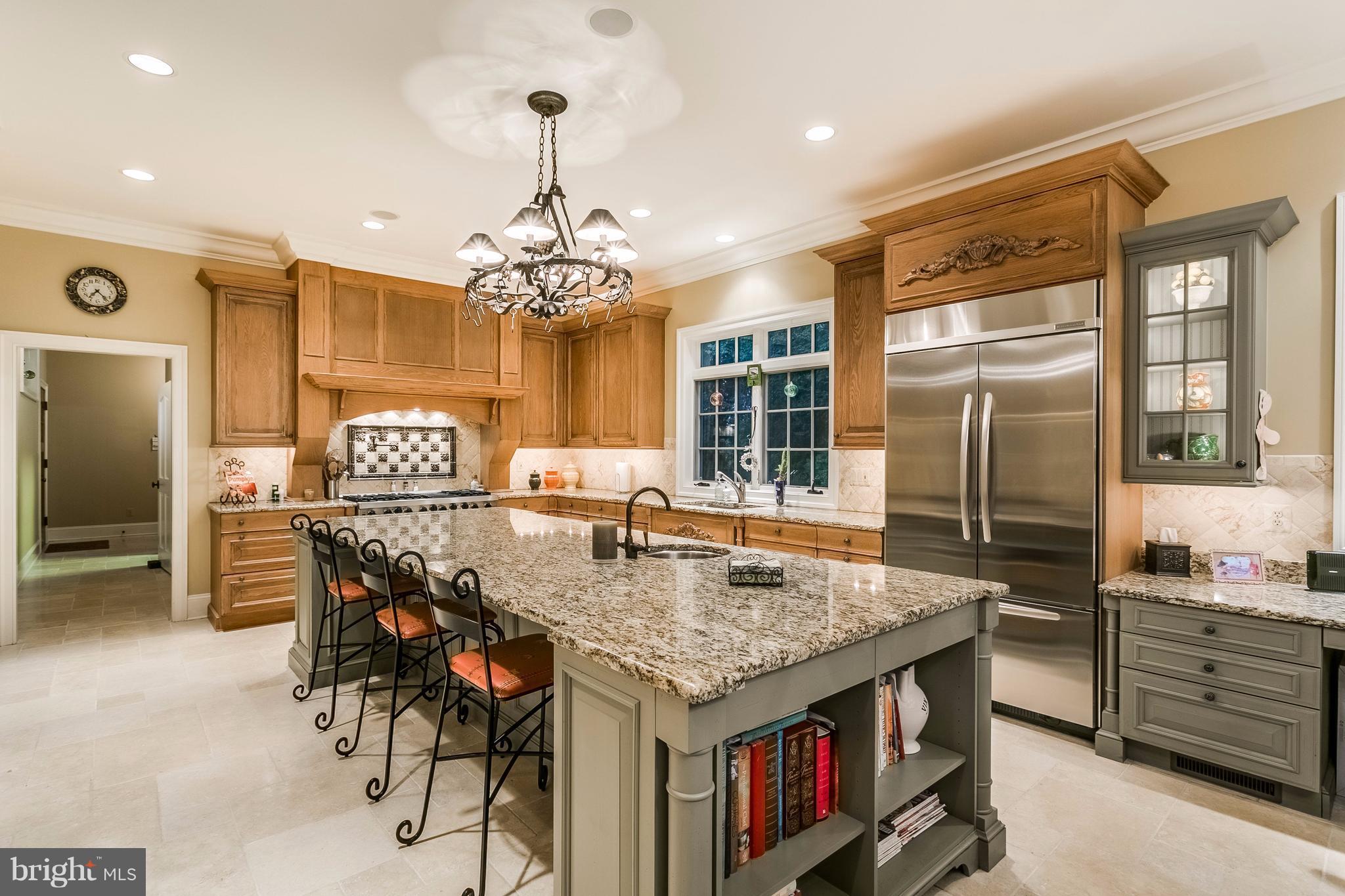 5 Hayfields Road Hunt Valley, MD 21030 - Photo 9 of 30 a kitchen with stainless steel appliances granite countertop a stove and refrigerator