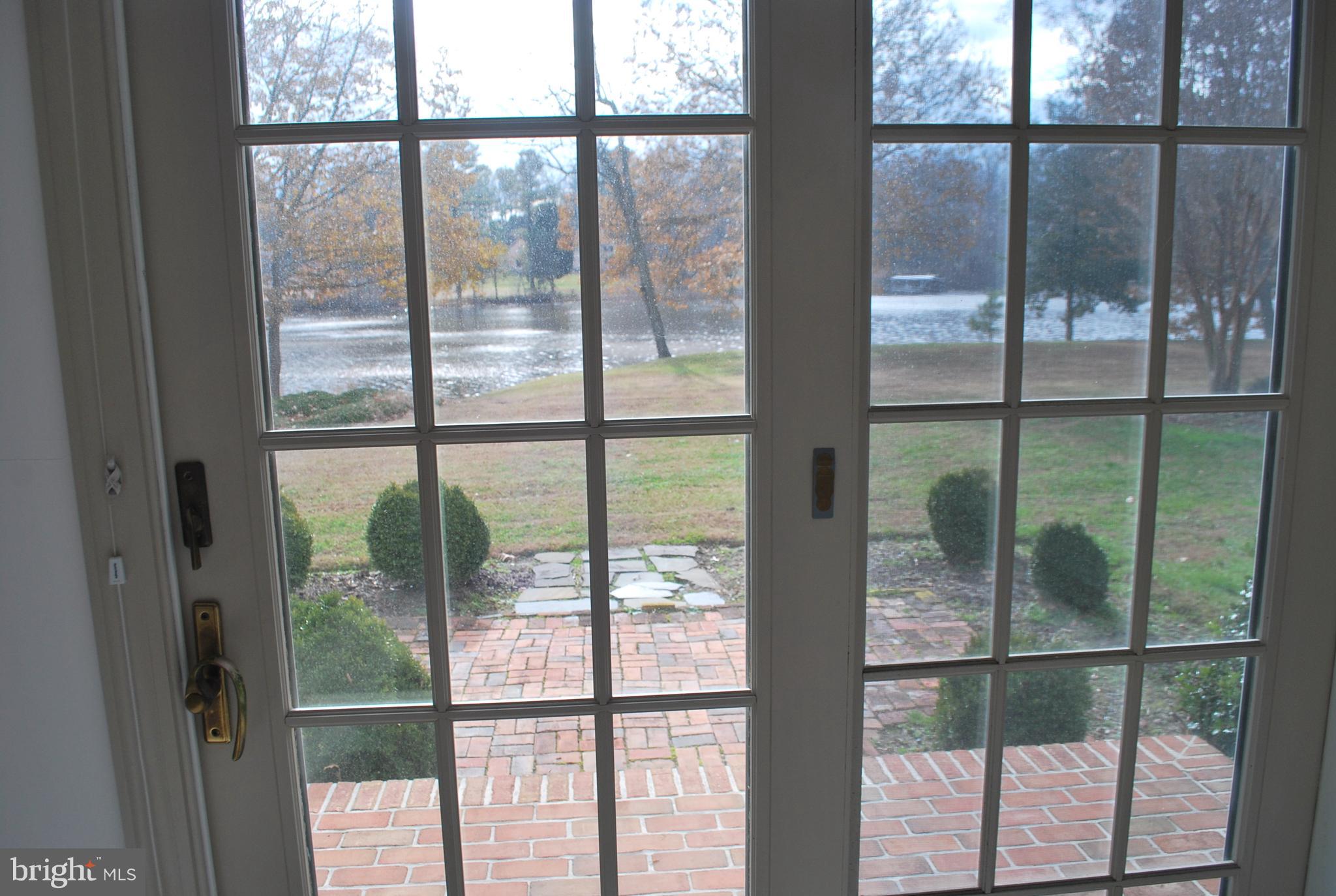 6765 Cookes Hope Road Easton, MD 21601 - Photo 29 of 46 French Doors off Master Bedroom to second patio