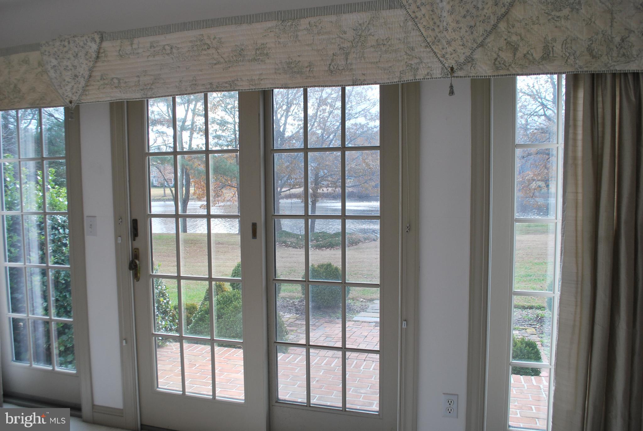 6765 Cookes Hope Road Easton, MD 21601 - Photo 30 of 46 French doors in Master Bedroom