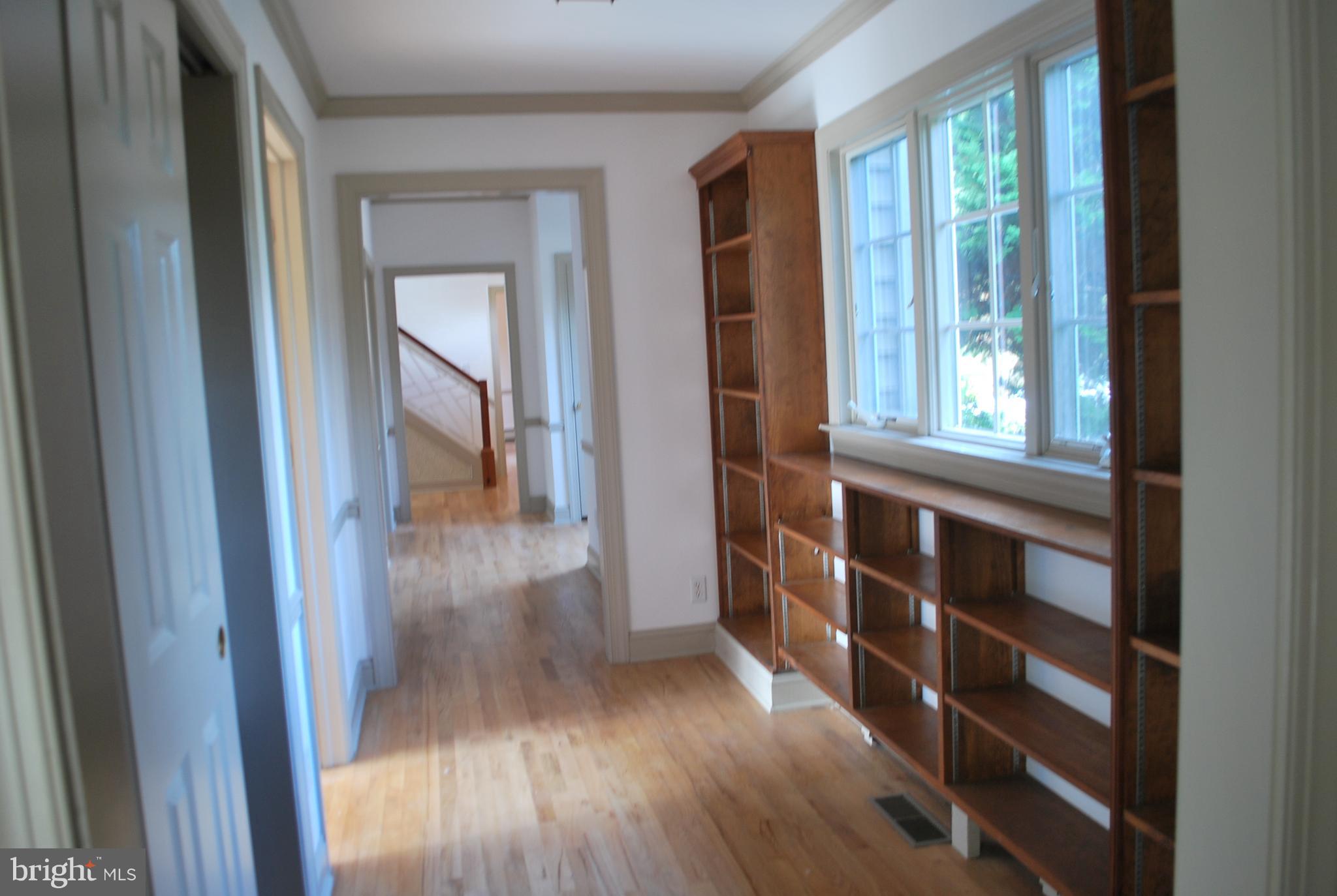 6765 Cookes Hope Road Easton, MD 21601 - Photo 35 of 46 Built ins through walkway to den and Master BR