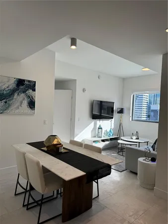 a view of a workspace with furniture