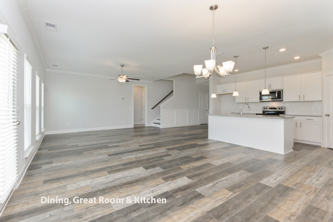 653 Castle Road Mount Juliet, TN 37122 - Photo 6 of 29 a view of a kitchen with a sink and dishwasher