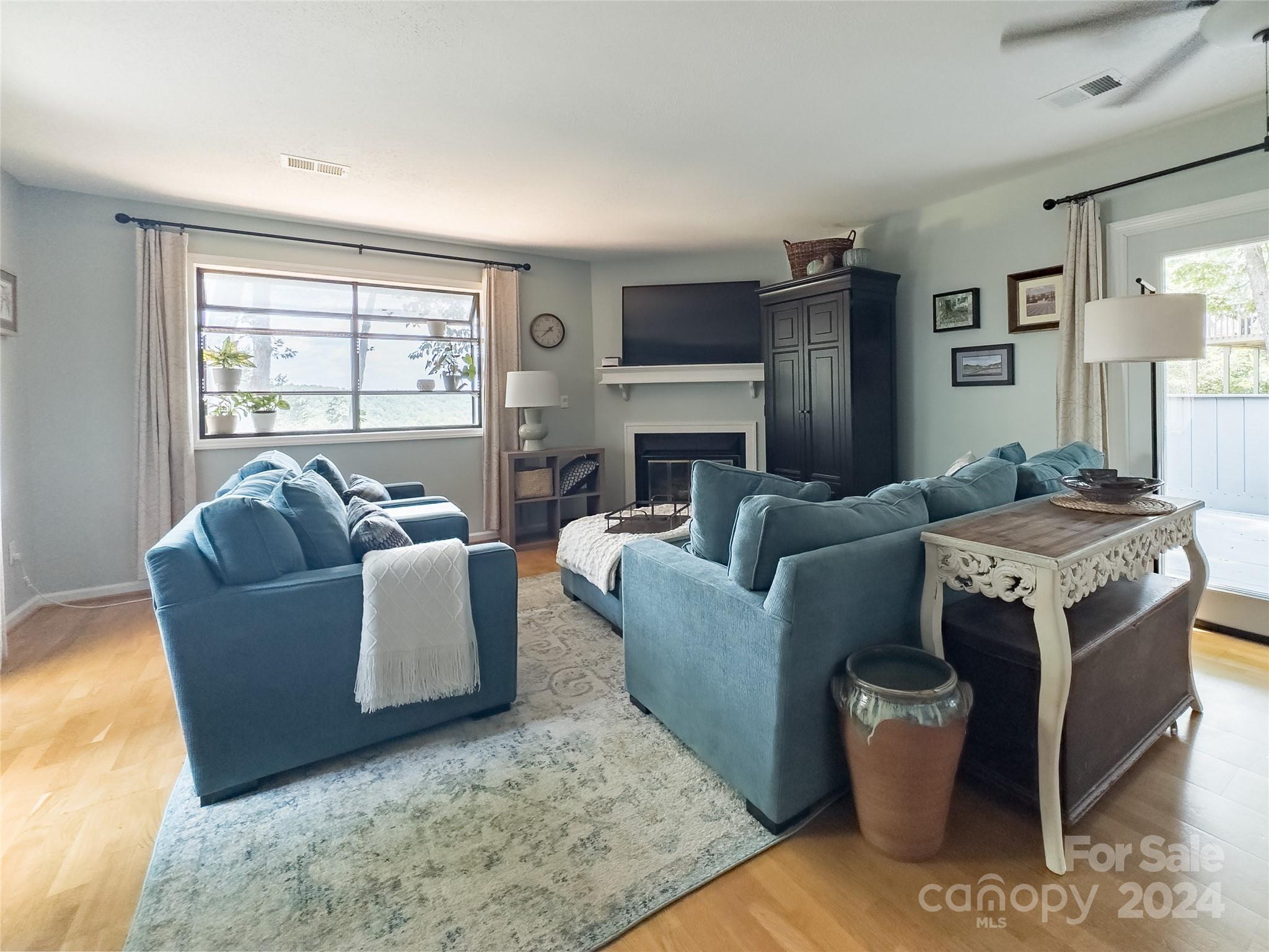 907 Victory Trail Morganton, NC 28655 - Photo 11 of 32 a living room with fireplace furniture and a window