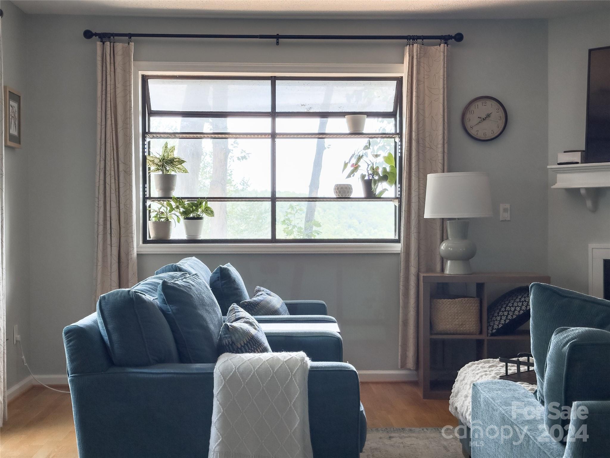 907 Victory Trail Morganton, NC 28655 - Photo 12 of 32 a living room with furniture and a window