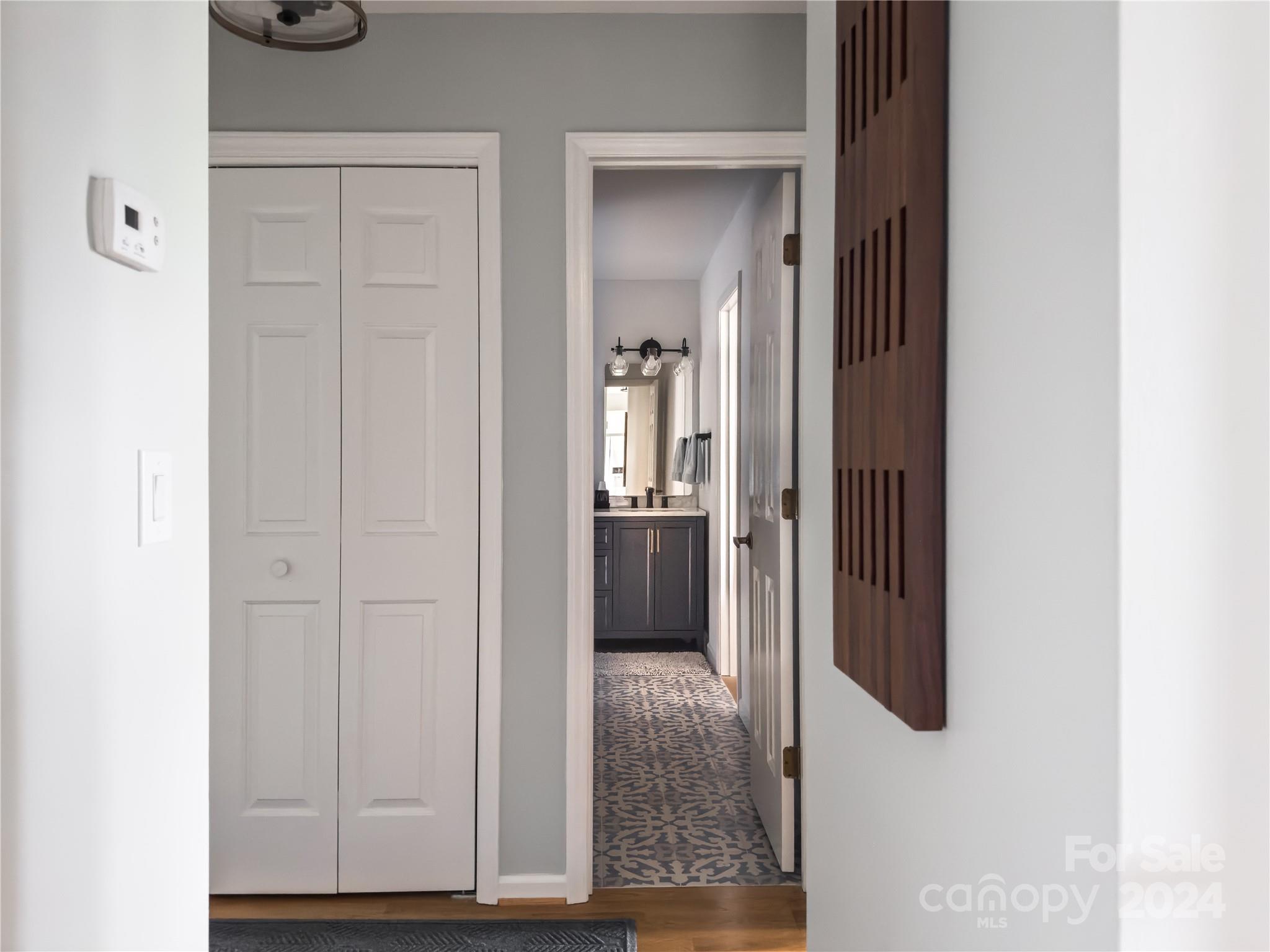 907 Victory Trail Morganton, NC 28655 - Photo 15 of 32 hallway view with wooden floor