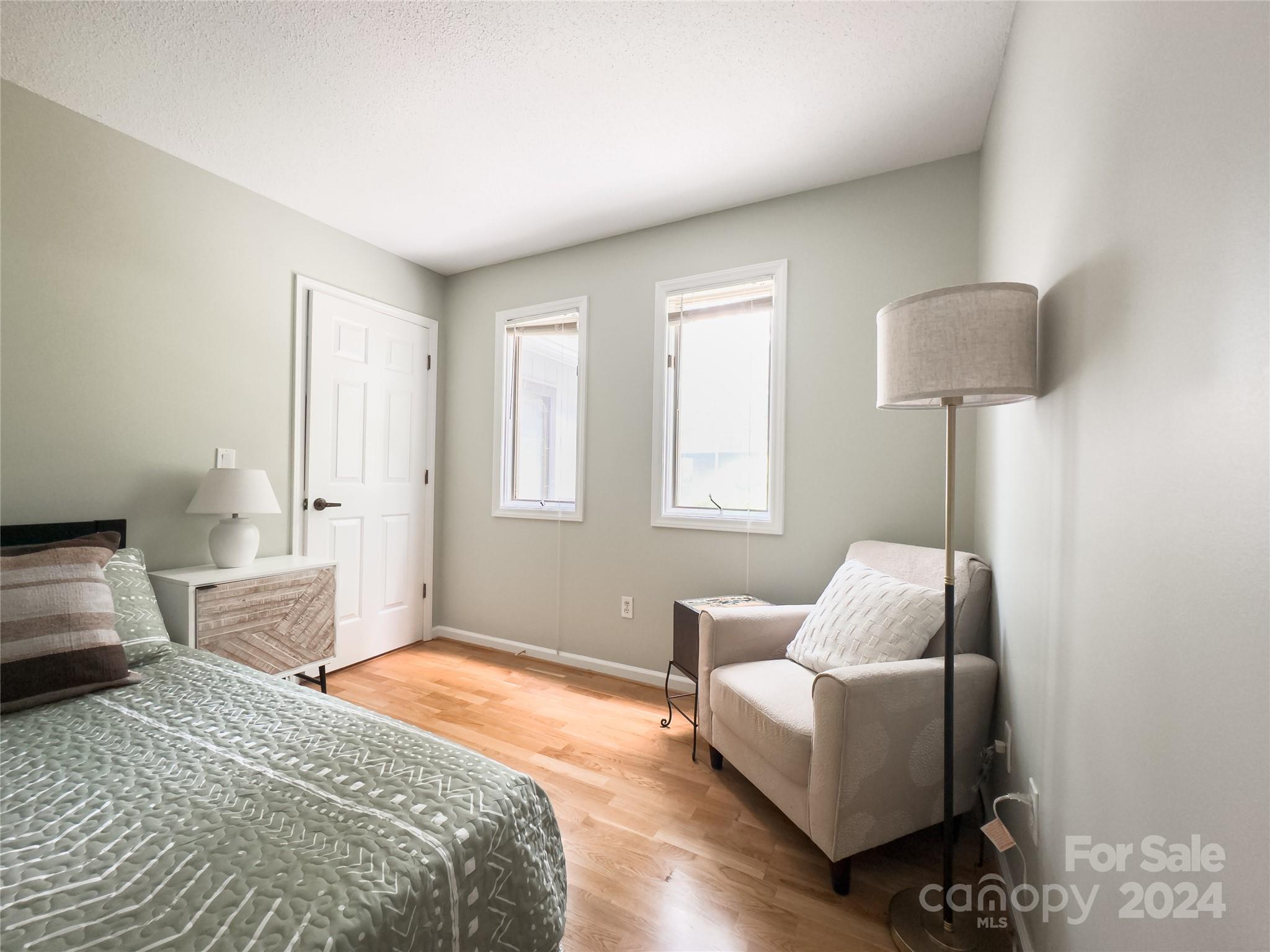 907 Victory Trail Morganton, NC 28655 - Photo 27 of 32 a bedroom with furniture and a window