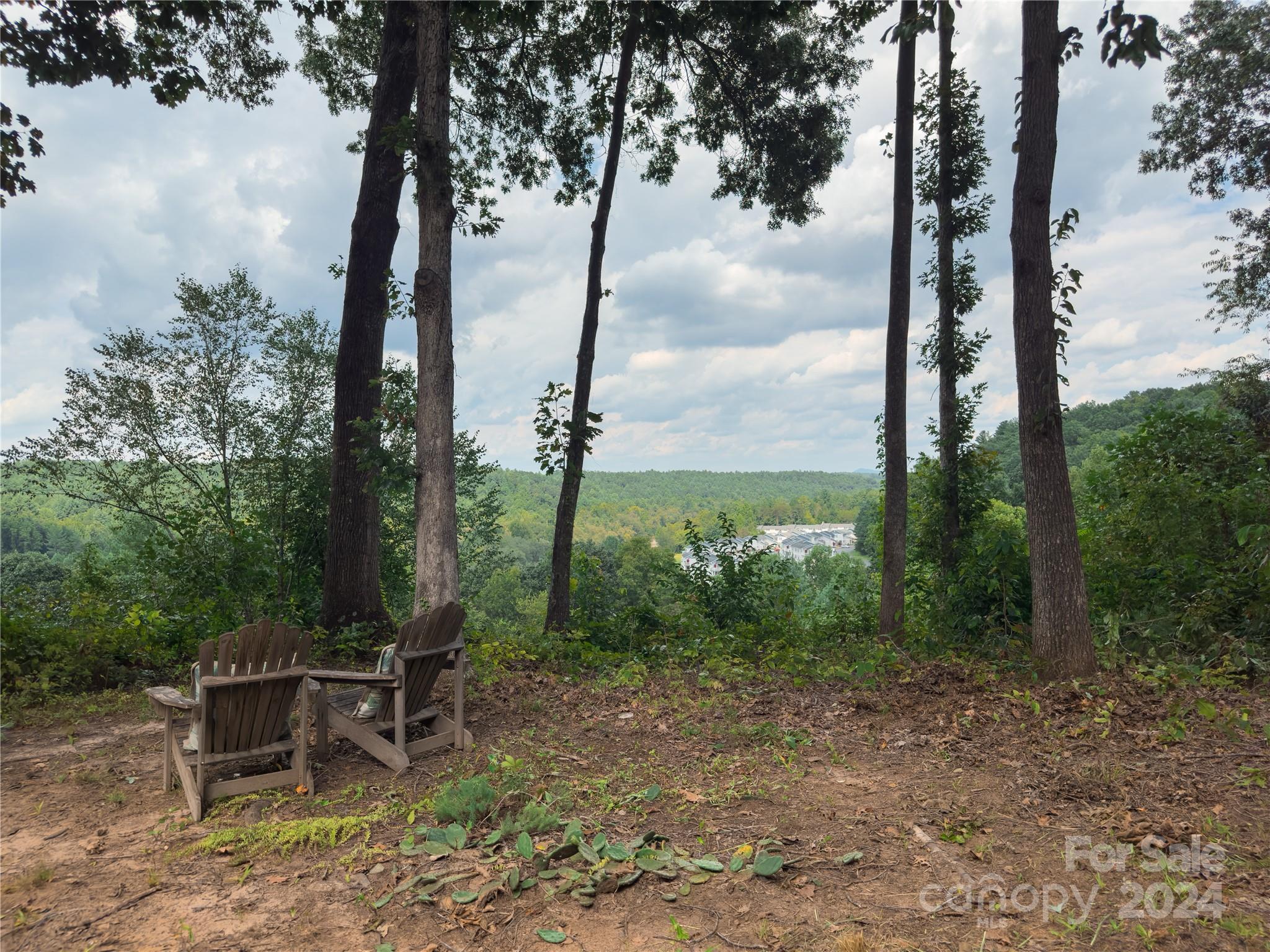 907 Victory Trail Morganton, NC 28655 - Photo 29 of 32 a view of a bench in the garden