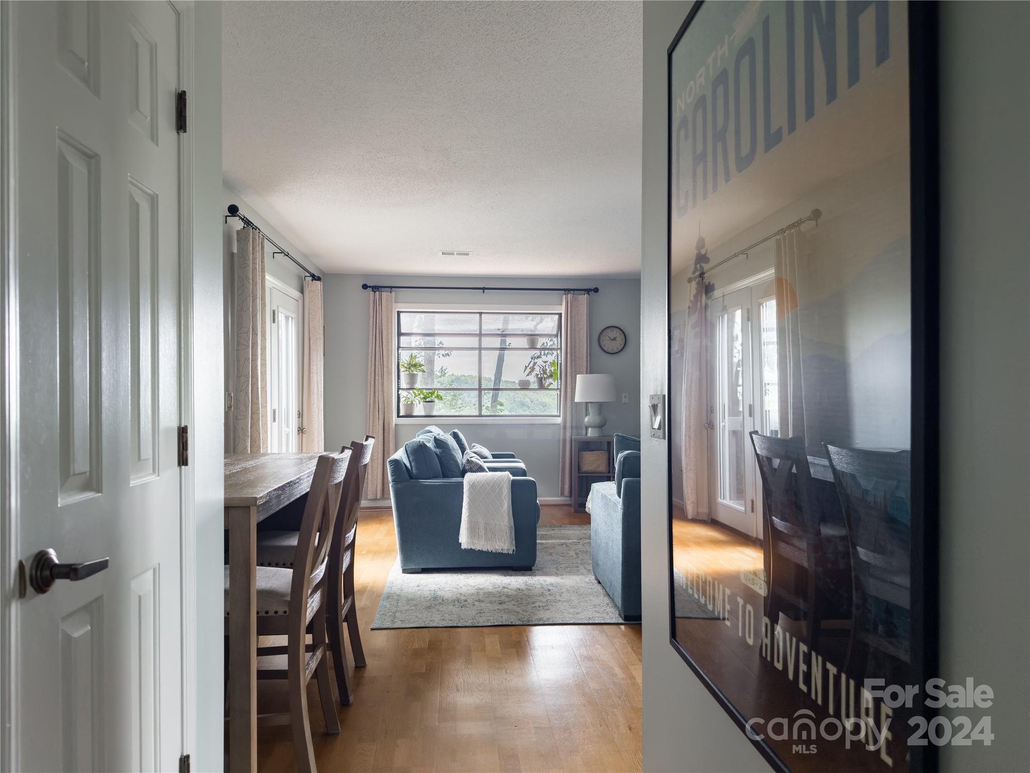 907 Victory Trail Morganton, NC 28655 - Photo 7 of 32 a view of a livingroom with furniture and windows