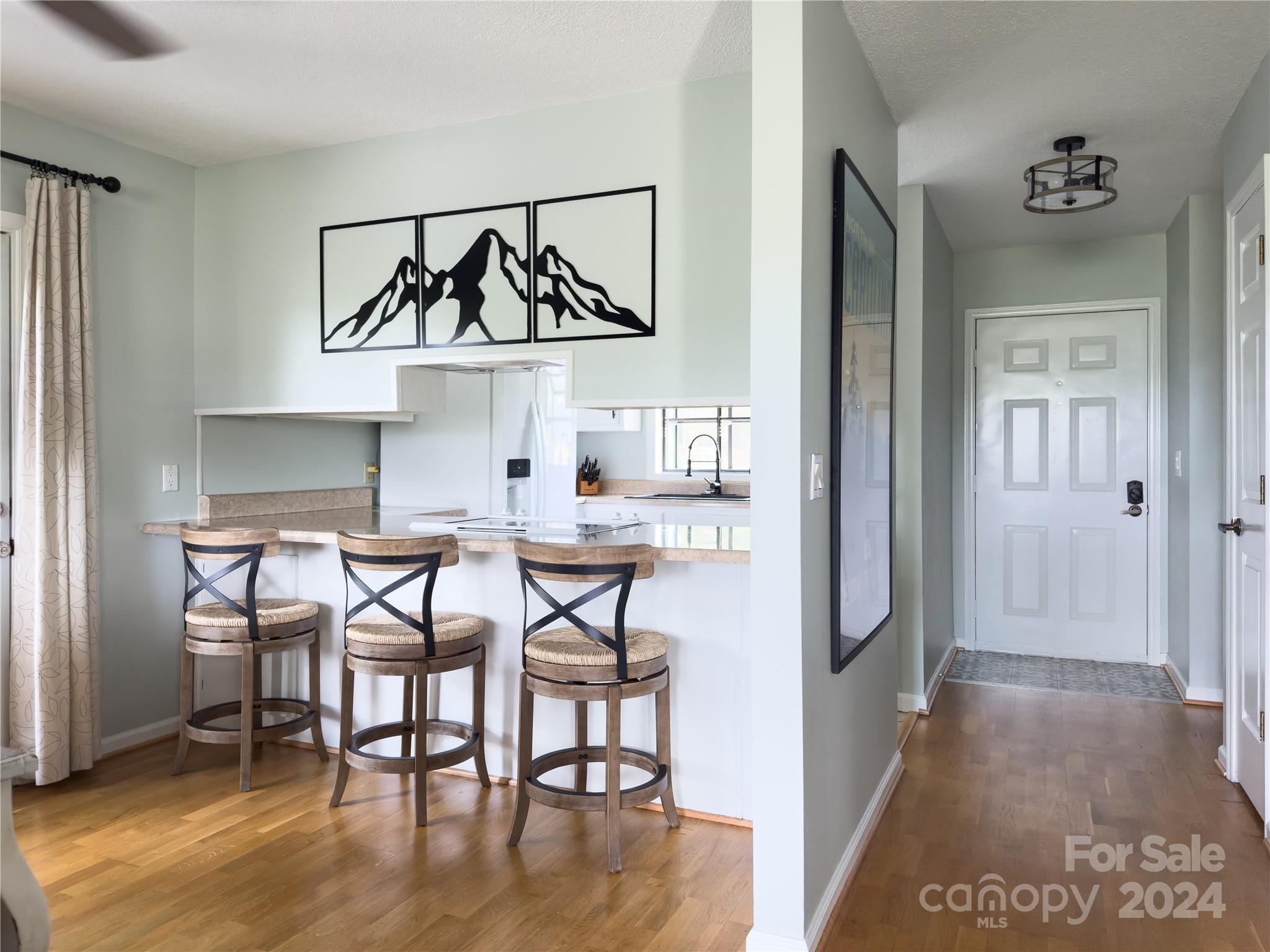 907 Victory Trail Morganton, NC 28655 - Photo 8 of 32 a view of a dining room with furniture