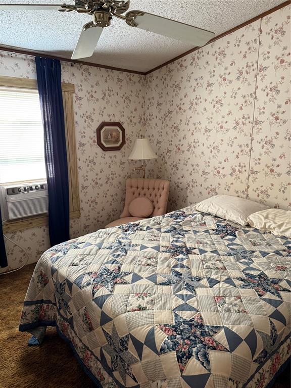 21605 Sundown Road Chandler, TX 75758 - Photo 11 of 14 a bedroom with a bed and a window