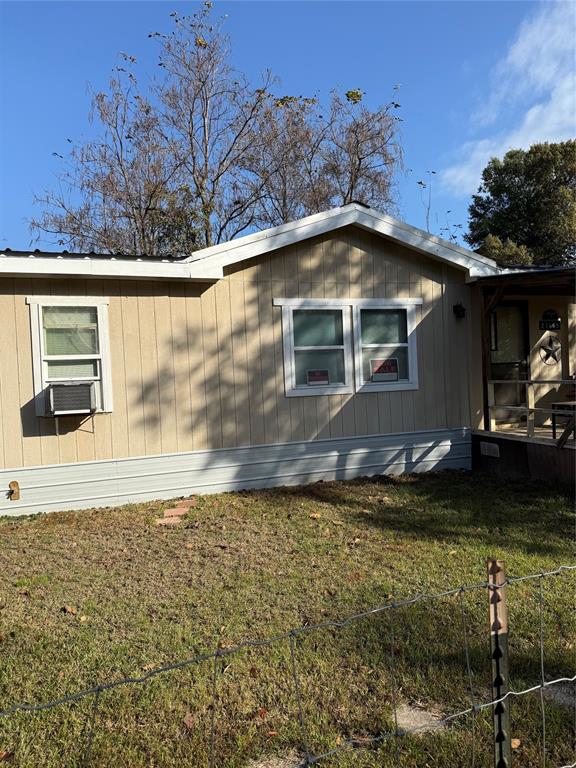 21605 Sundown Road Chandler, TX 75758 - Photo 13 of 14 a front view of a house with a yard