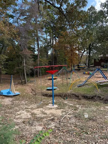 a view of park with swings