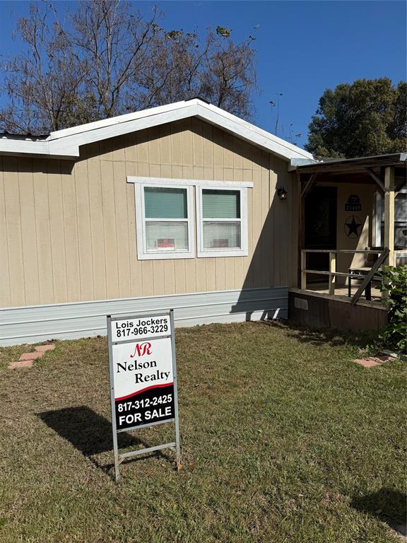 21605 Sundown Road Chandler, TX 75758 - Photo 5 of 14 a front view of a house with garden