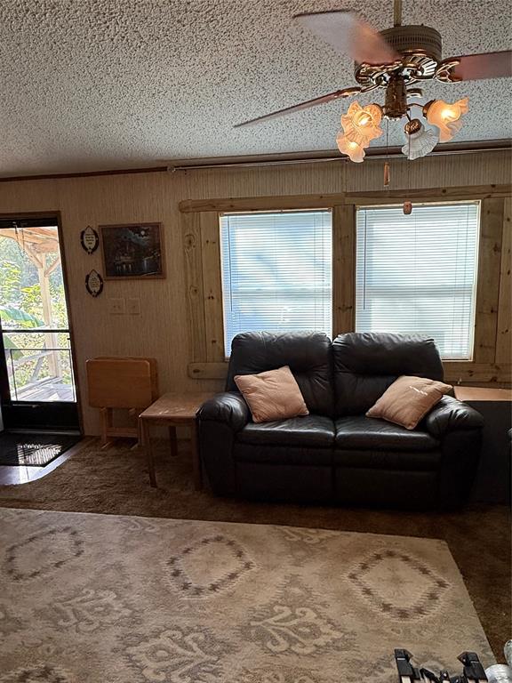 21605 Sundown Road Chandler, TX 75758 - Photo 6 of 14 a living room with furniture and a flat screen tv