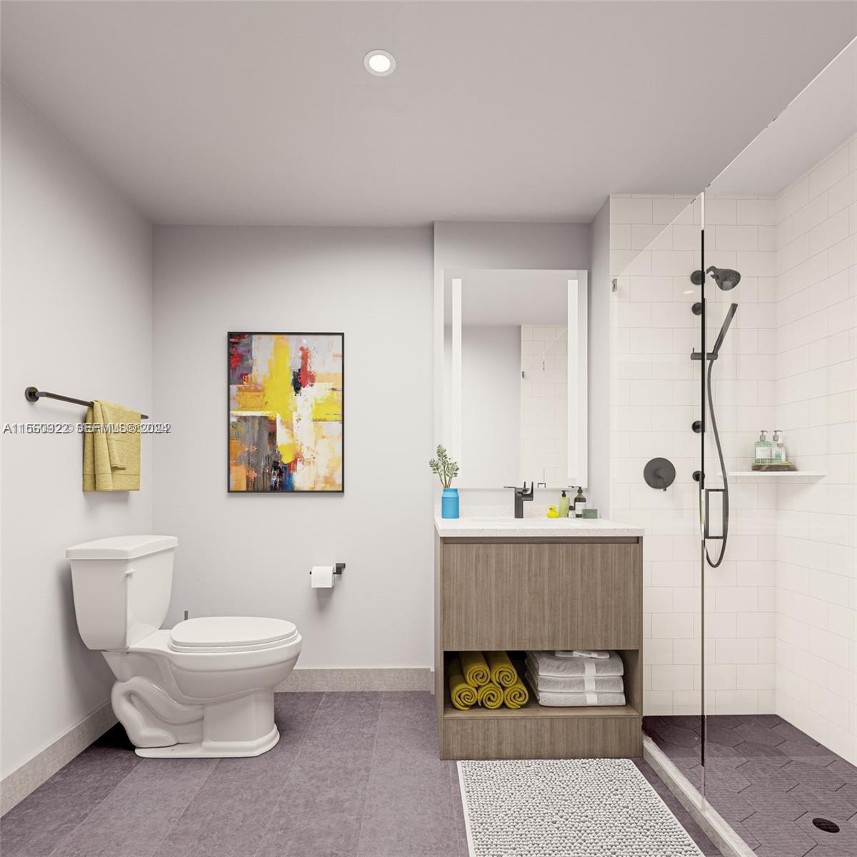 398 Northeast 5th Street, Unit 4708 Miami, FL 33132 - Photo 12 of 12 a bathroom with a sink toilet and shower