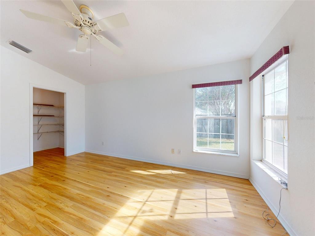 7558 Southwest 103rd Loop Ocala, FL 34476 - Photo 23 of 38 a view of an empty room with a window