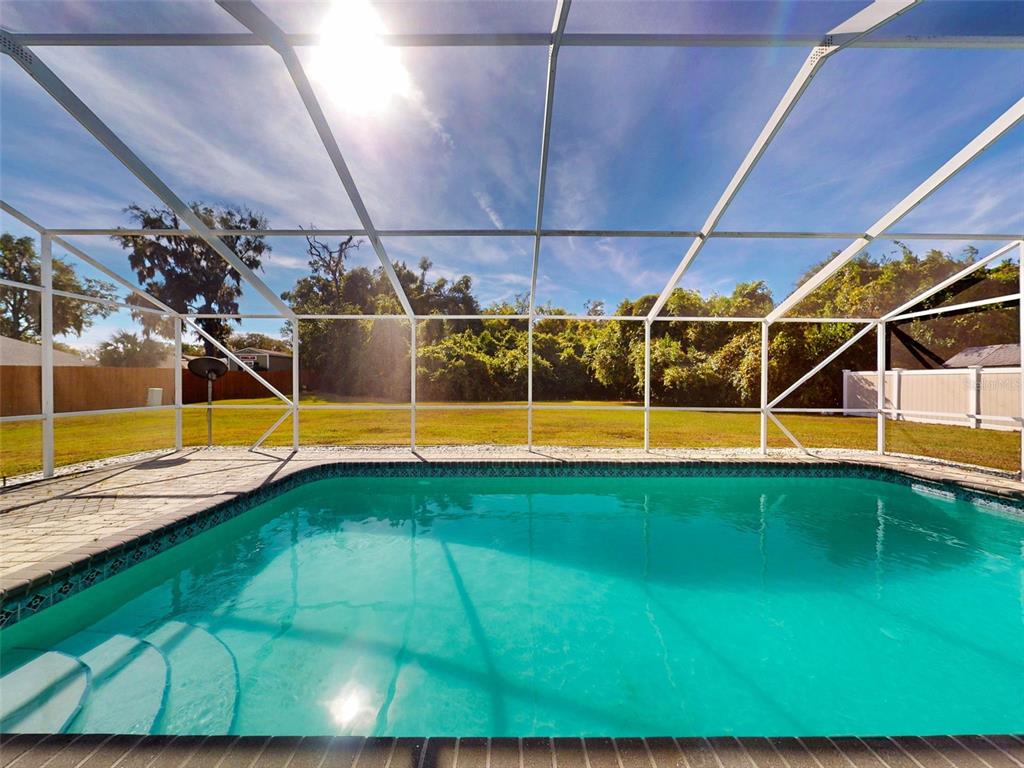 7558 Southwest 103rd Loop Ocala, FL 34476 - Photo 29 of 38 a view of a backyard