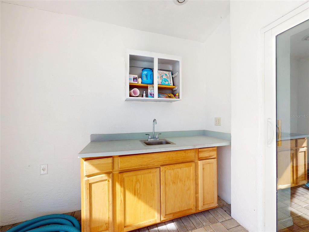 7558 Southwest 103rd Loop Ocala, FL 34476 - Photo 33 of 38 a room with storage and utility