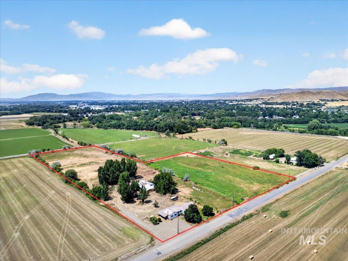 587 Cove Road Weiser, ID 83672 - Photo 24 of 30 Expansive rural property featuring multiple land parcels, mature trees, open fields, and direct road frontage