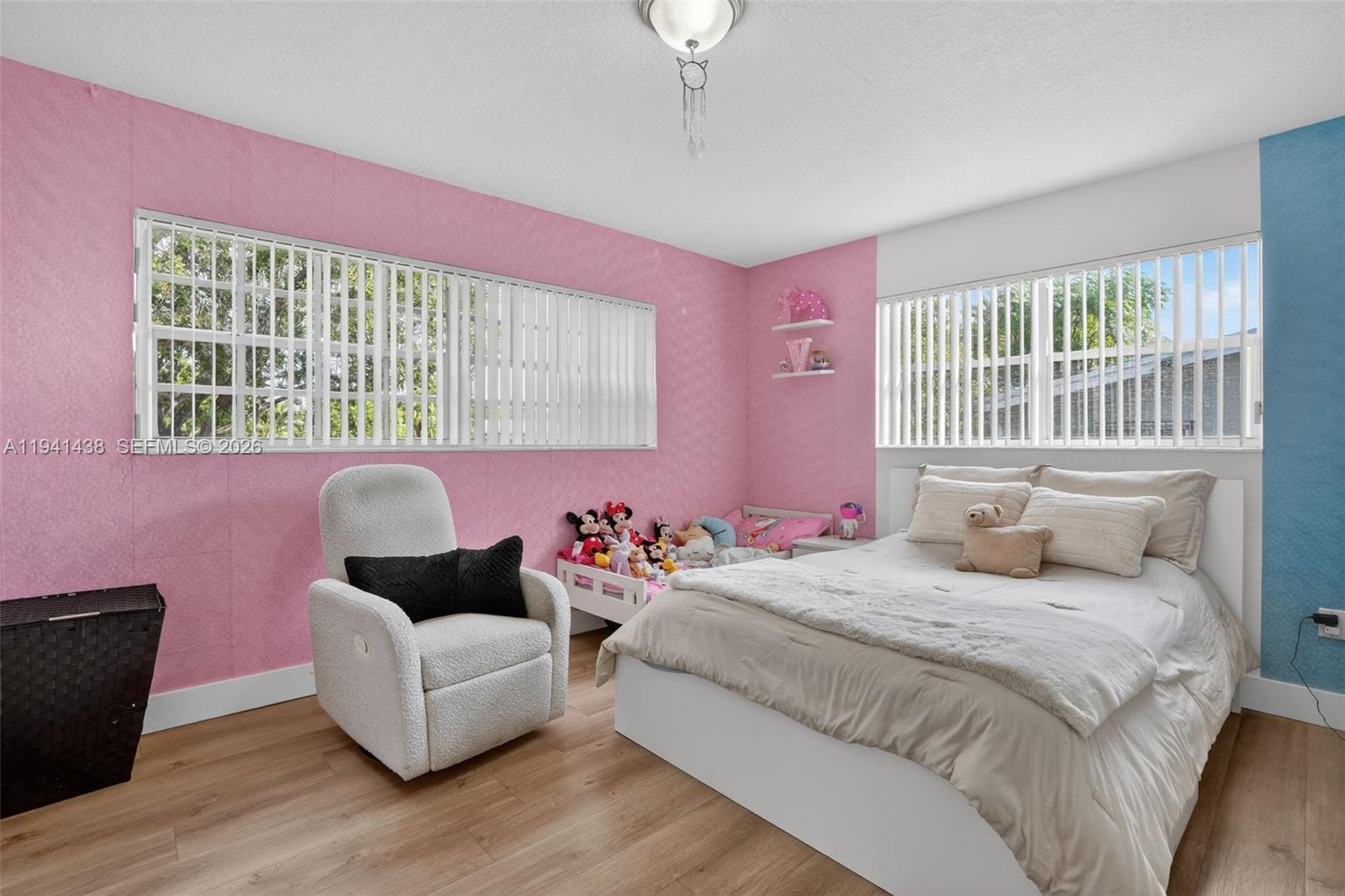 8500 Southwest 16th Street Miami, FL 33155 - Photo 14 of 26 a bedroom with a bed and a couch