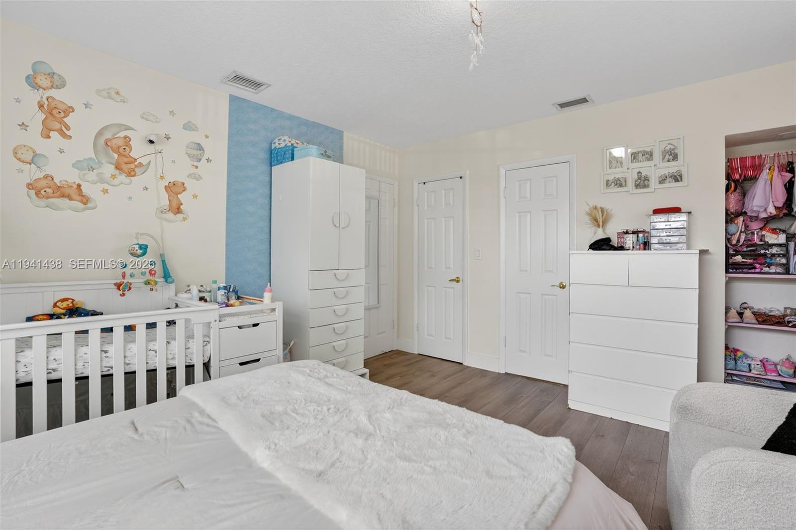 8500 Southwest 16th Street Miami, FL 33155 - Photo 15 of 26 a bedroom with a bed and furniture