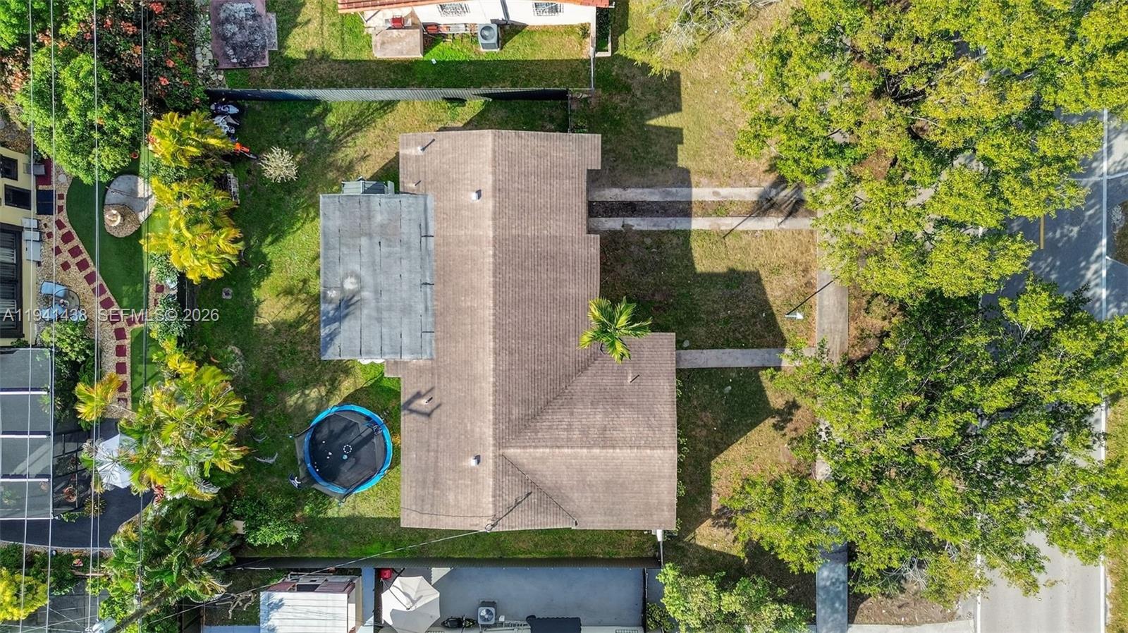 8500 Southwest 16th Street Miami, FL 33155 - Photo 24 of 26 an aerial view of a house with a yard