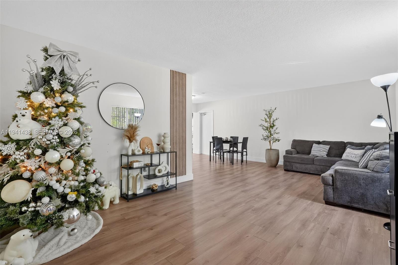 8500 Southwest 16th Street Miami, FL 33155 - Photo 4 of 26 a living room with furniture and wooden floor