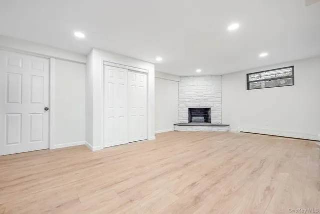 a bathroom with a toilet a sink and shower