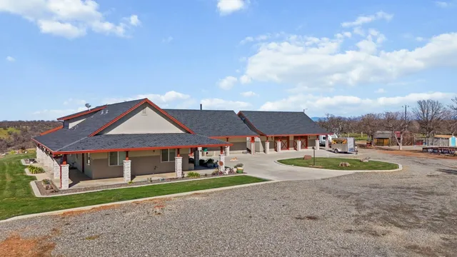 a bathroom with a toilet a sink and a mirror