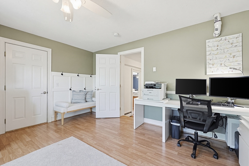 18 Anchorage Road Franklin, MA 02038 - Photo 16 of 42 a view of a workspace with furniture and wooden floor