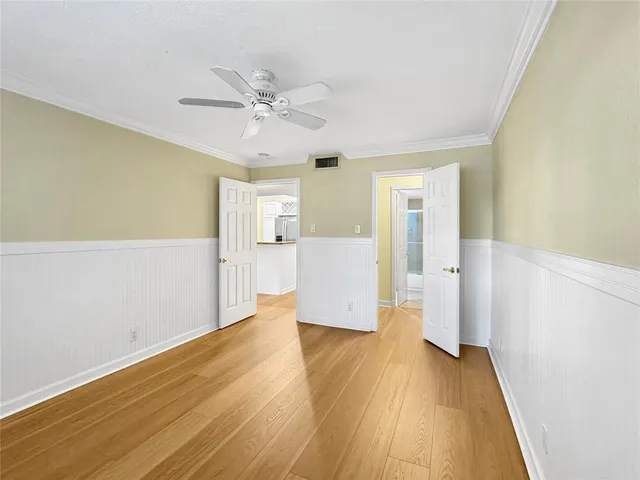 a view of a bathroom with a glass door