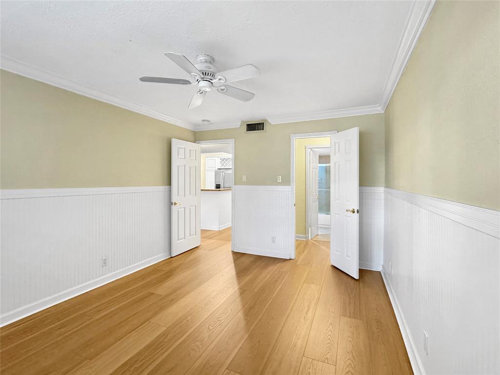 1515 East Broward Boulevard, Unit 107 Fort Lauderdale, FL 33301 - Photo 12 of 36 Create your sanctuary in this spacious bedroom with walk-in closet and en suite-style bath access.