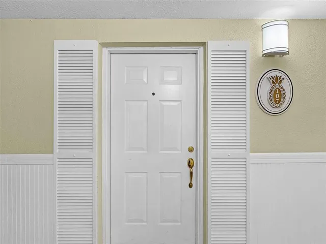 a view of a entryway door front of house