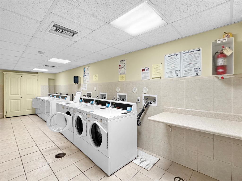 1515 East Broward Boulevard, Unit 107 Fort Lauderdale, FL 33301 - Photo 20 of 36 Clean, convenient on-site laundry room for residents.