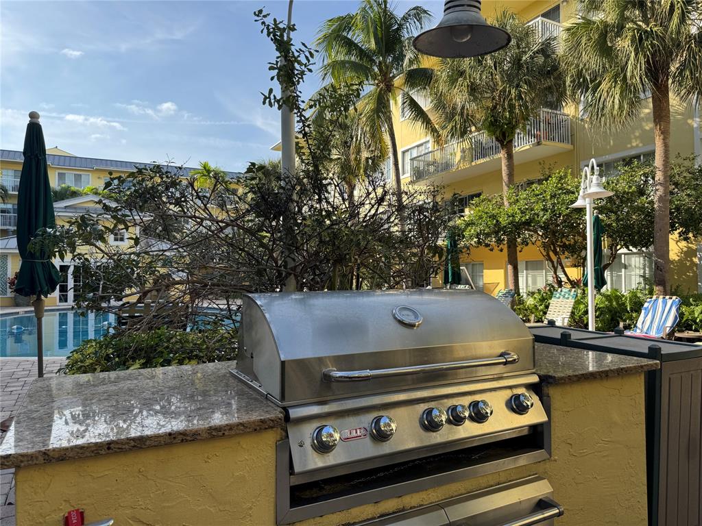 1515 East Broward Boulevard, Unit 107 Fort Lauderdale, FL 33301 - Photo 21 of 36 Grill and dine just outside your door in the beautifully landscaped BBQ area.