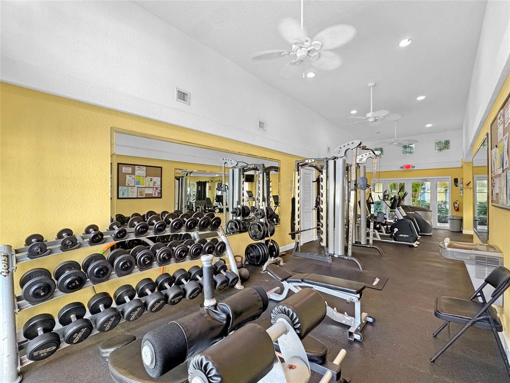 1515 East Broward Boulevard, Unit 107 Fort Lauderdale, FL 33301 - Photo 23 of 36 Workout with a view in the bright and airy gym space.