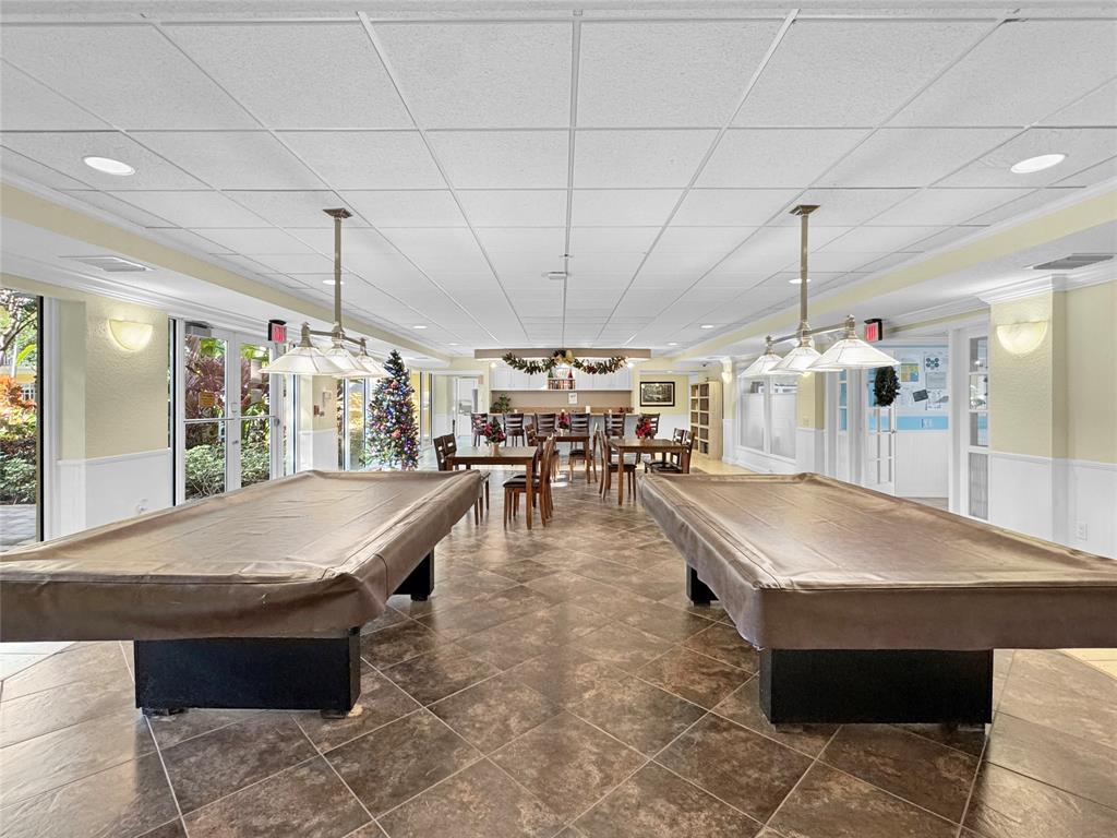 1515 East Broward Boulevard, Unit 107 Fort Lauderdale, FL 33301 - Photo 31 of 36 Challenge friends to a game in the resident billiards area