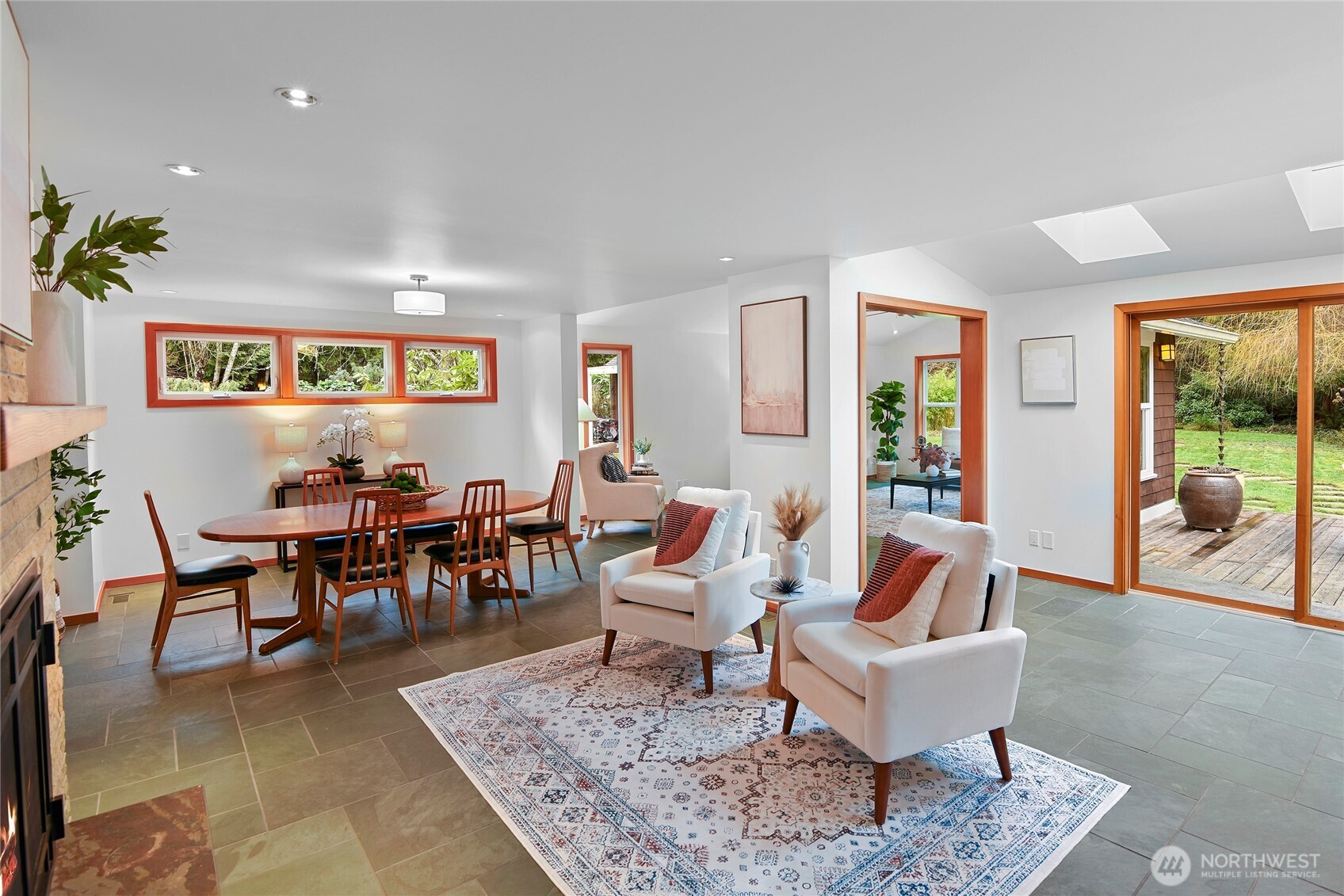 6133 Lariat Loop Bainbridge Island, WA 98110 - Photo 13 of 40 a living room with furniture and a rug