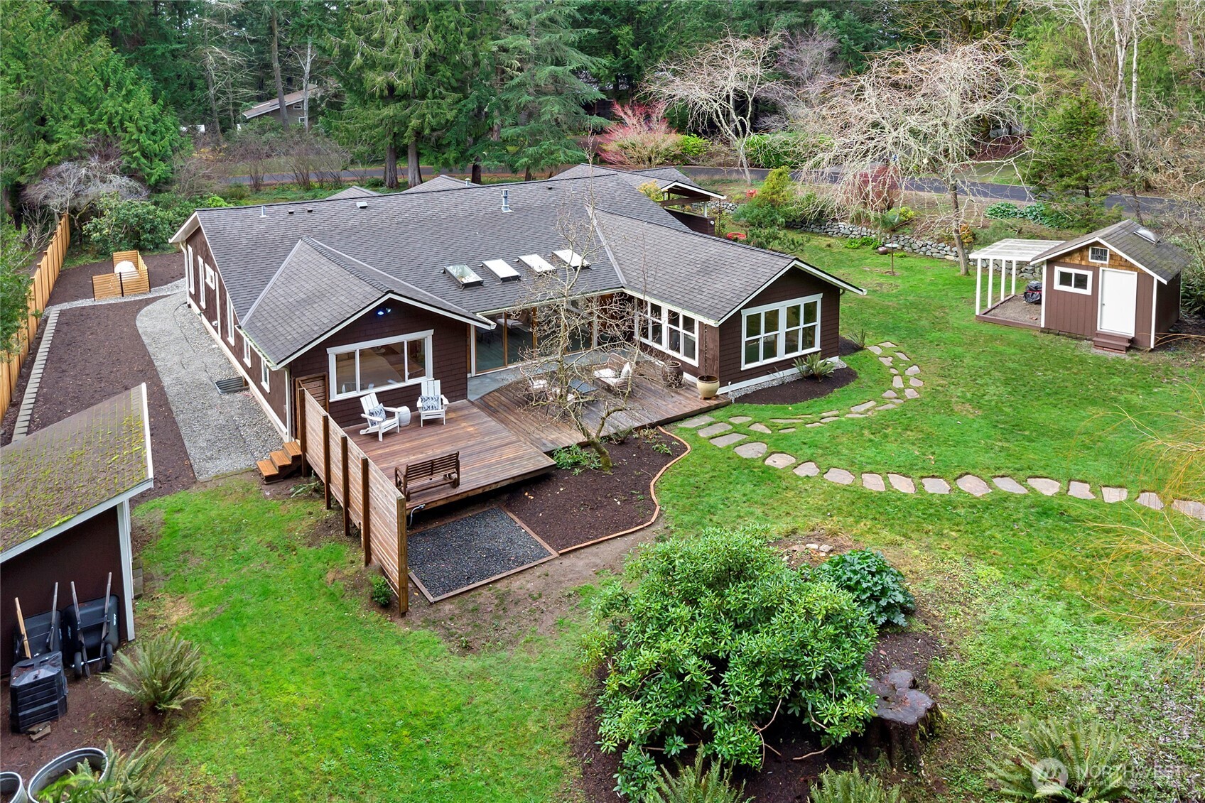 6133 Lariat Loop Bainbridge Island, WA 98110 - Photo 14 of 40 an aerial view of a house with backyard space and garden
