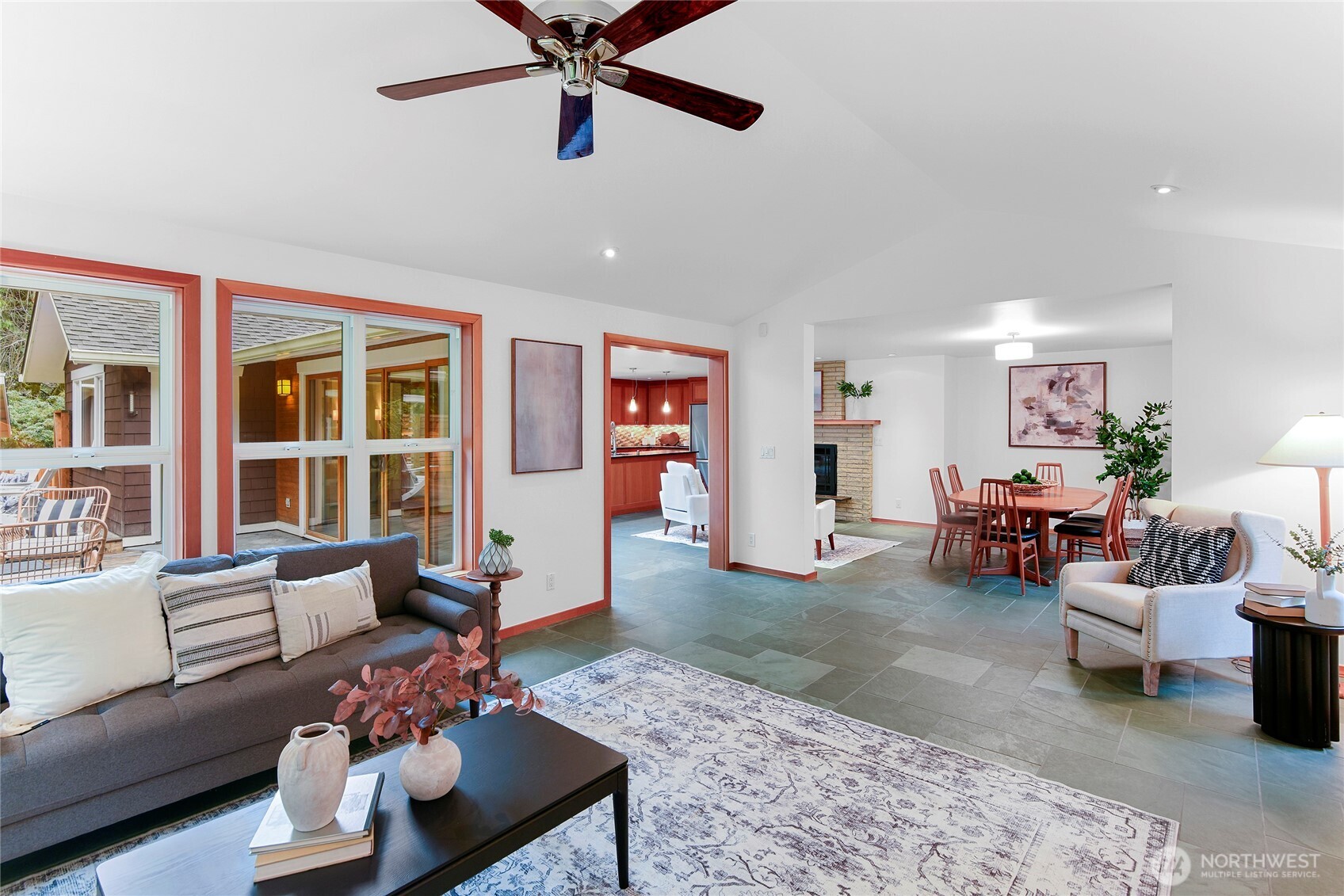 6133 Lariat Loop Bainbridge Island, WA 98110 - Photo 20 of 40 a living room with furniture and a large window