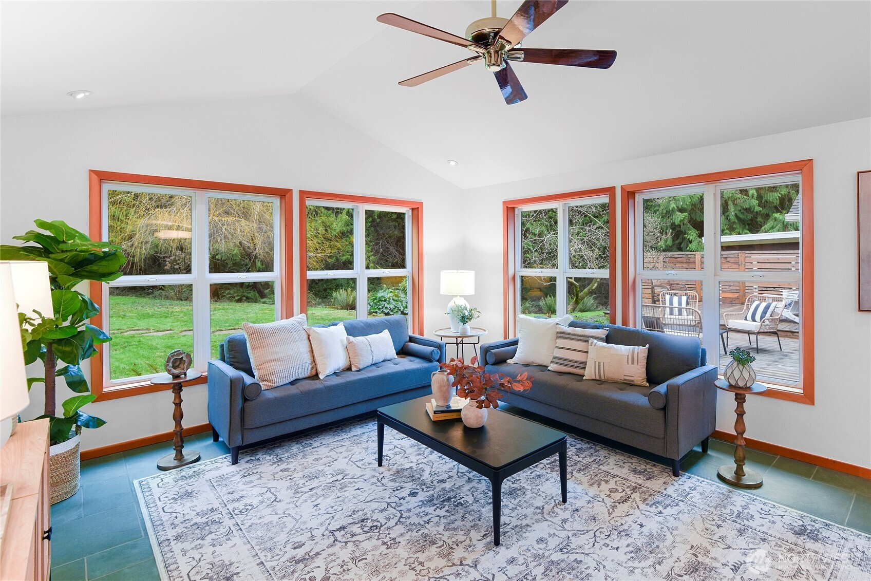 6133 Lariat Loop Bainbridge Island, WA 98110 - Photo 21 of 40 a living room with furniture and a large window