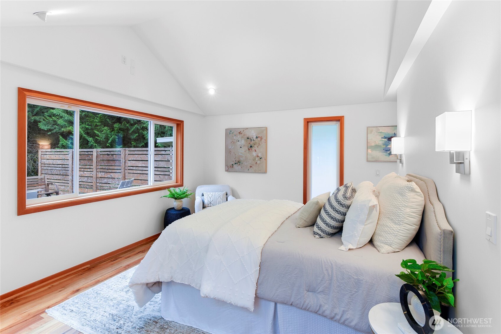 6133 Lariat Loop Bainbridge Island, WA 98110 - Photo 26 of 40 a bedroom with a bed and a window