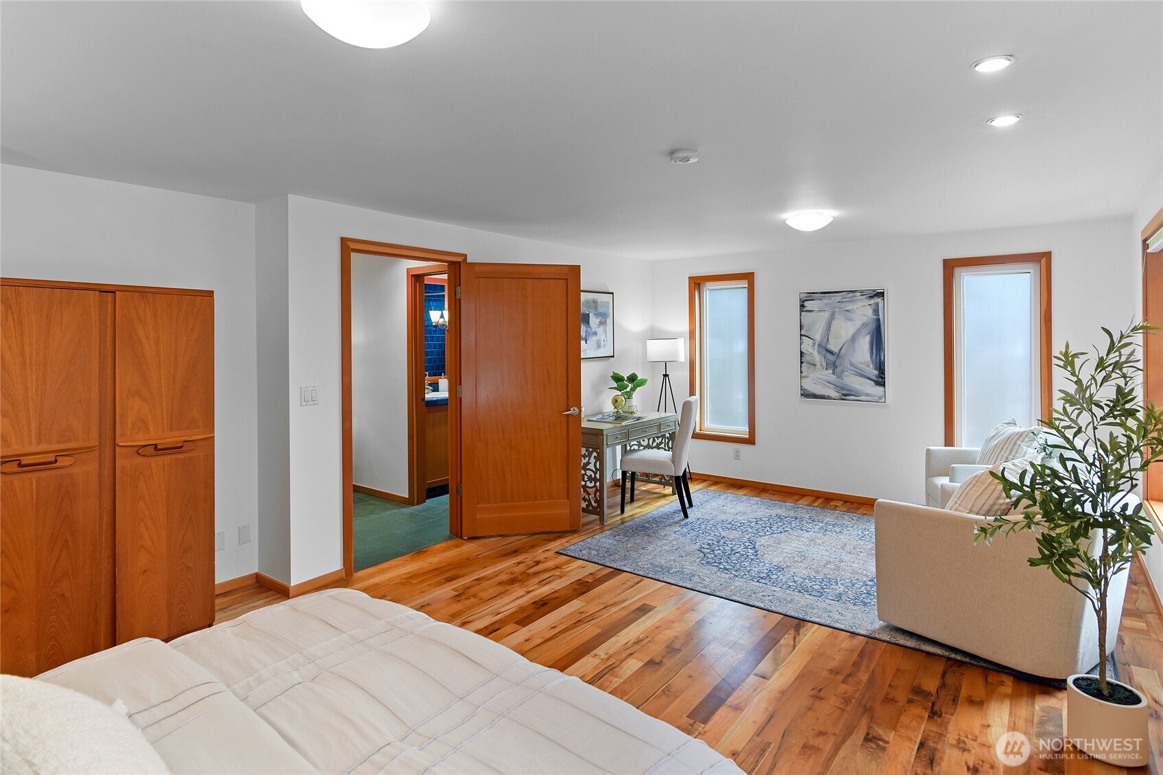 6133 Lariat Loop Bainbridge Island, WA 98110 - Photo 36 of 40 a bedroom with a bed and a dresser