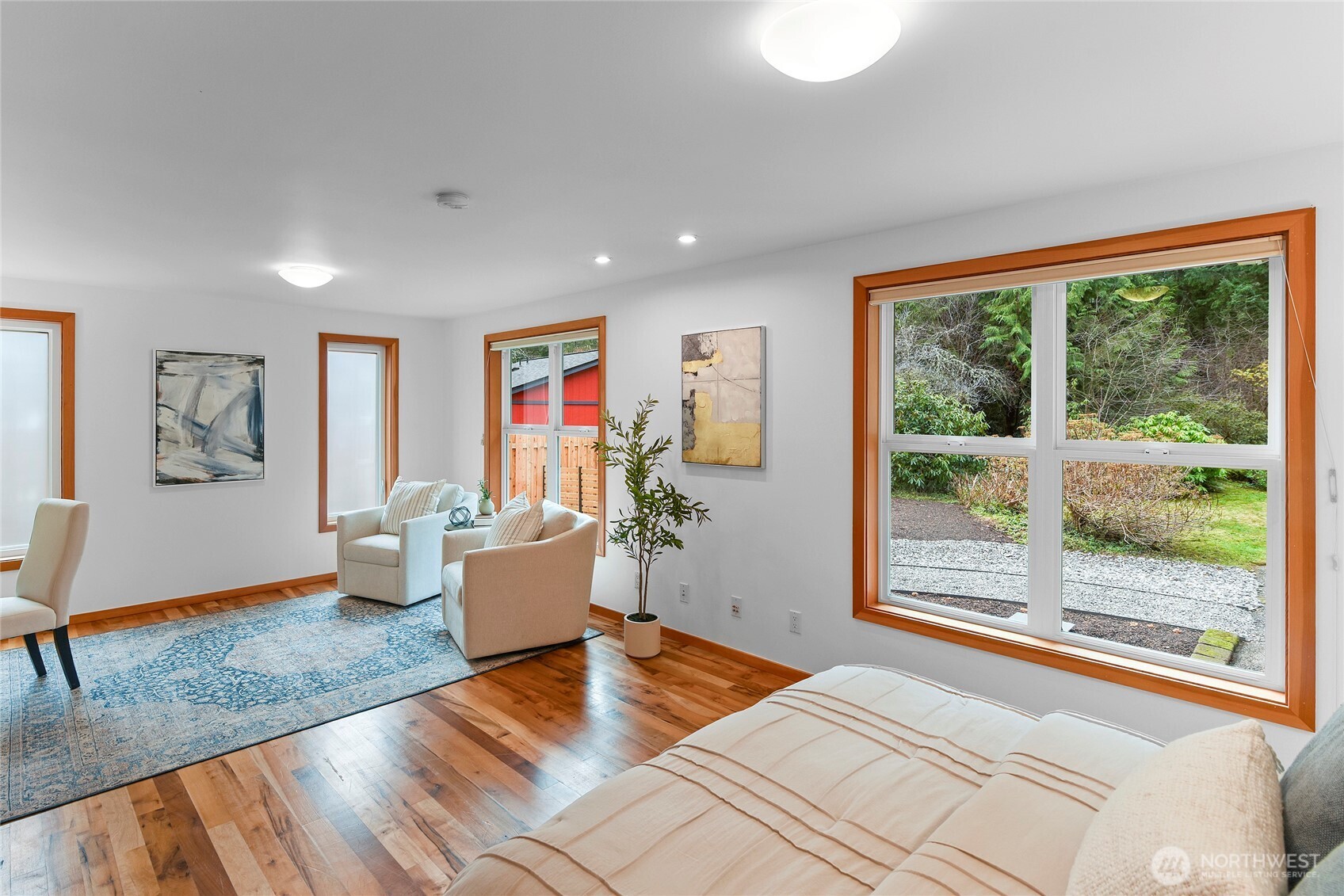 6133 Lariat Loop Bainbridge Island, WA 98110 - Photo 37 of 40 a living room with furniture and a large window
