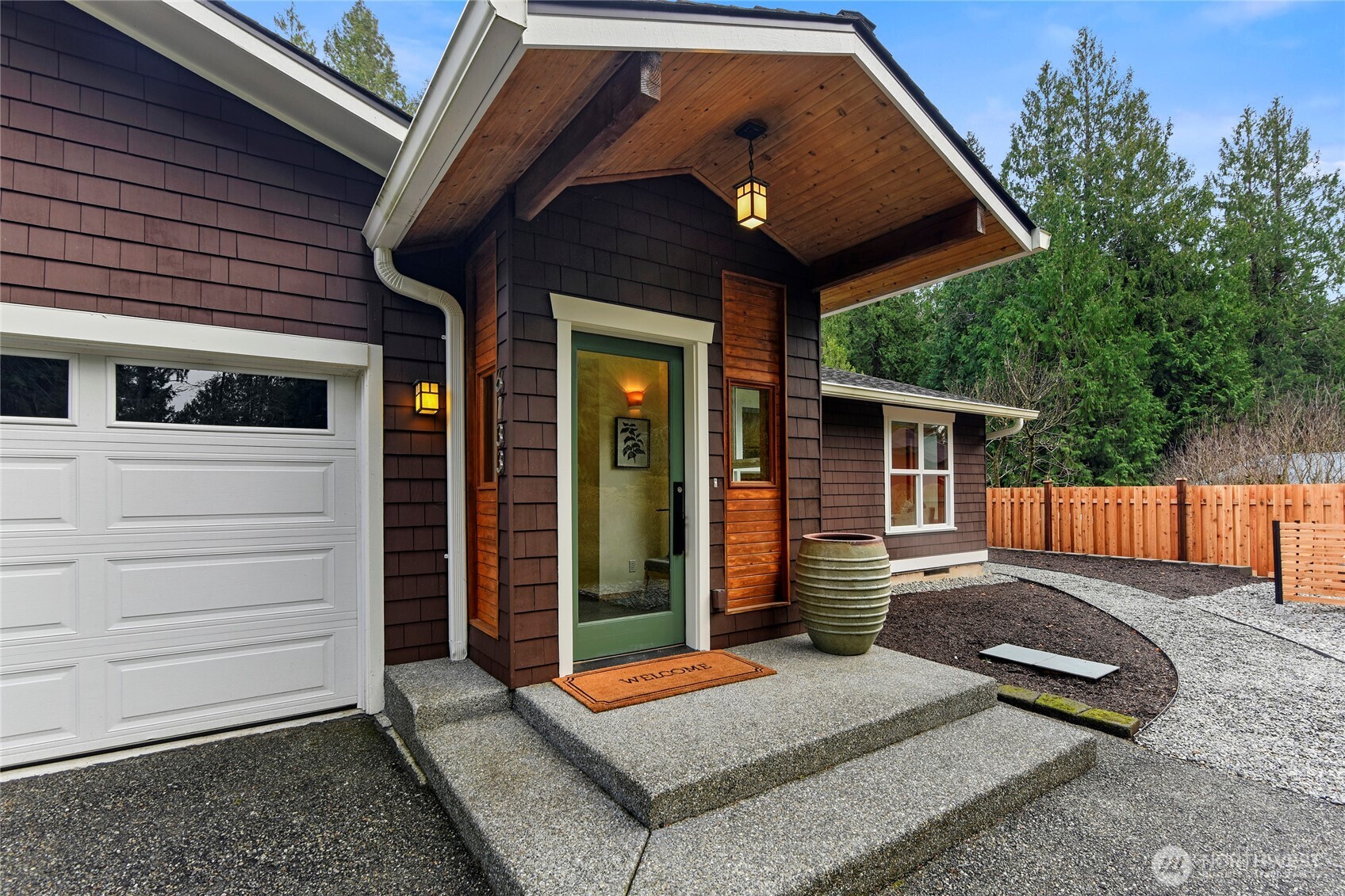 6133 Lariat Loop Bainbridge Island, WA 98110 - Photo 7 of 40 a view of house with backyard and outdoor seating