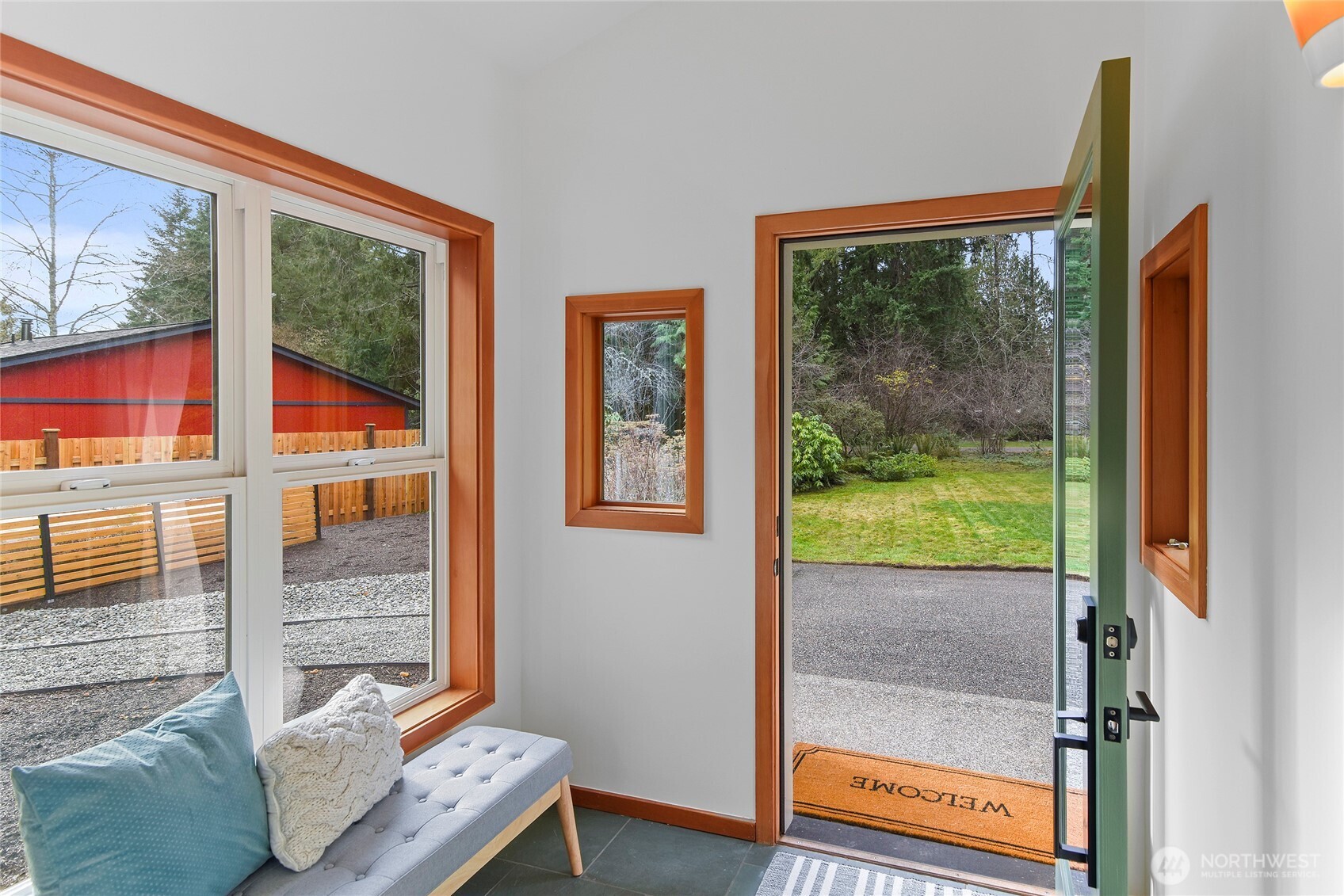 6133 Lariat Loop Bainbridge Island, WA 98110 - Photo 9 of 40 a living room with furniture and a window