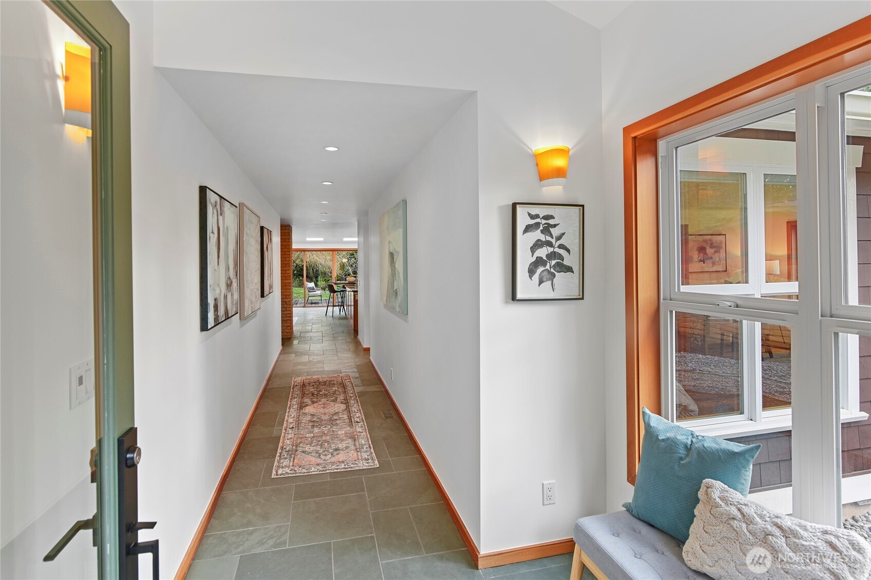 6133 Lariat Loop Bainbridge Island, WA 98110 - Photo 10 of 40 a view of a hallway with furniture and windows